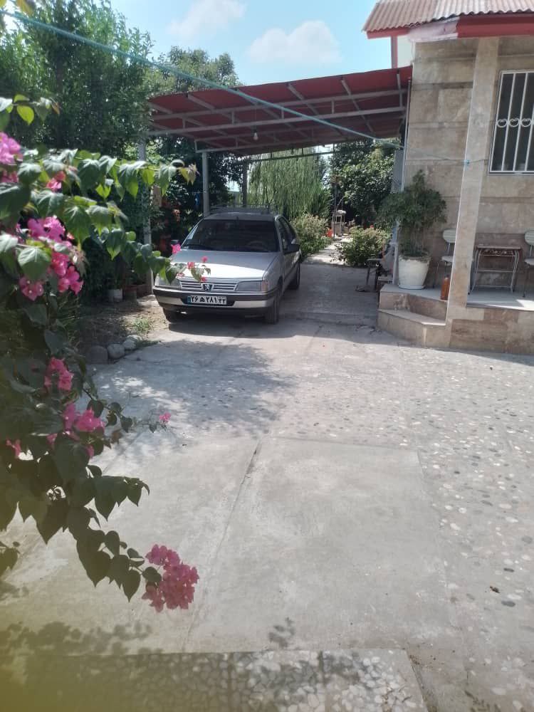 photo_1_2025-12-19_01-40-47 ویلا باغ 600 متری در جاده آمل به سرخرود نمای حیاط و پارکینگ