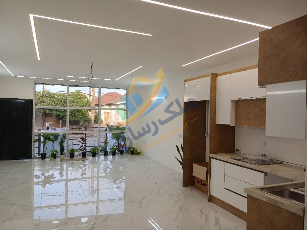 ویلا فلت نوساز با نمای مدرن در جاده سرخرود نمای بیرونی مدرن ویلا فلت دو خوابه طراحی داخلی و نورگیری ویلا فلت زمین و فضای سبز ویلای نوساز نمای سالن