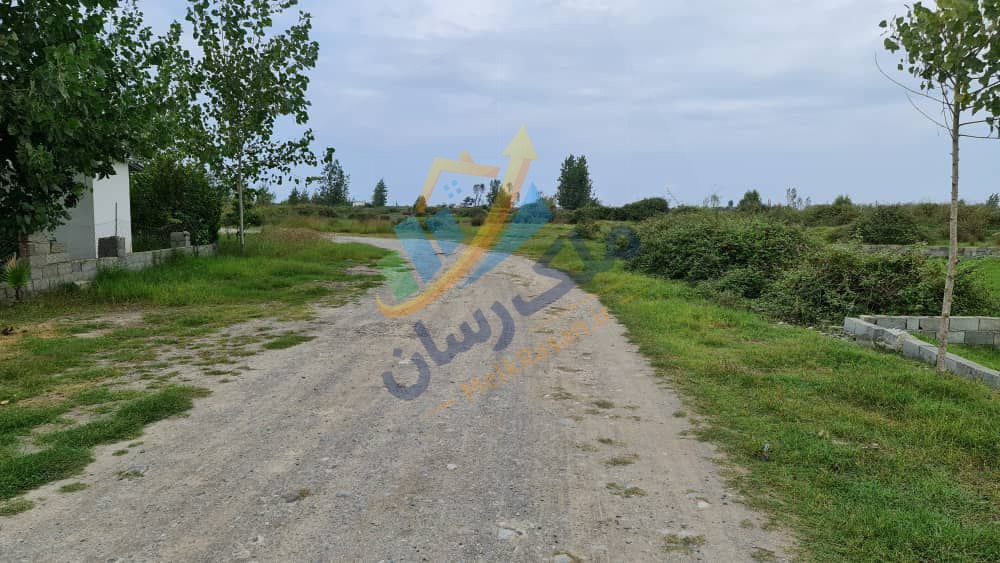 photo_6_2025-12-29_01-49-19 ملک باغی ۲۵۰ متری سنددار نزدیک ساحل محمودآباد با قابلیت ساخت ویلا باغ زیبا