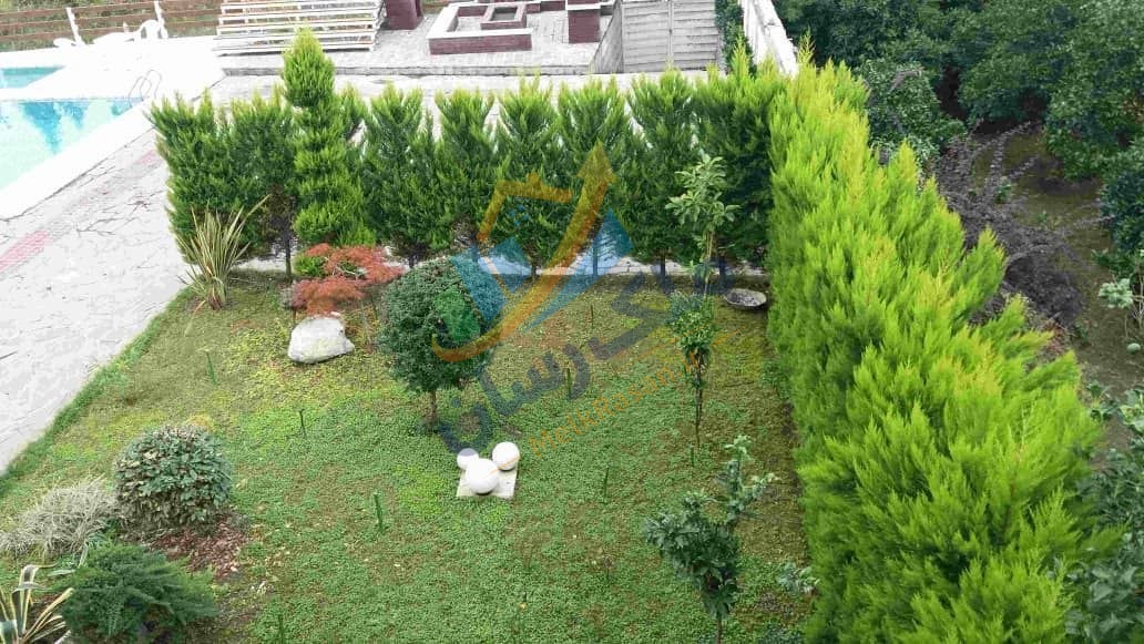 photo_12_2026-01-29_00-45-52 شهرک ویلایی ساحلی در نوشهر شامل ده دستگاه ویلا با ویوی کامل دریا و جنگل، اسکله اختصاصی و مشاعات کامل نمای فضای سبز شهرک