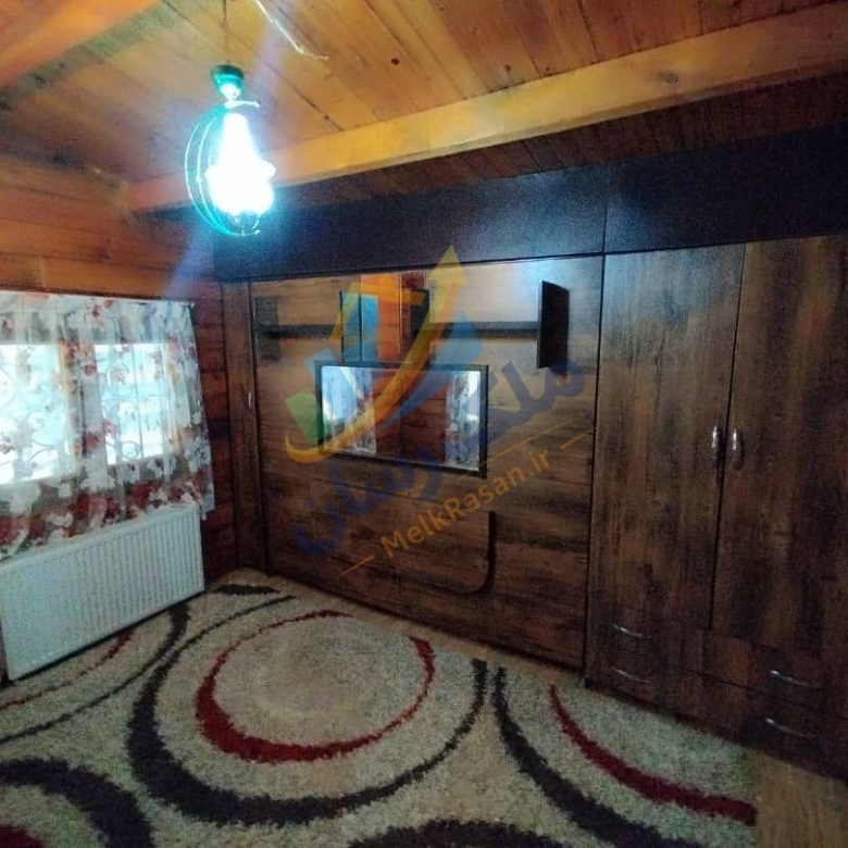ویلای فلت چوبی نوشهر با ۲۴۰ متر زمین و ۸۰ متر بنا، دو خواب و فول فرنیش نمای اتاق