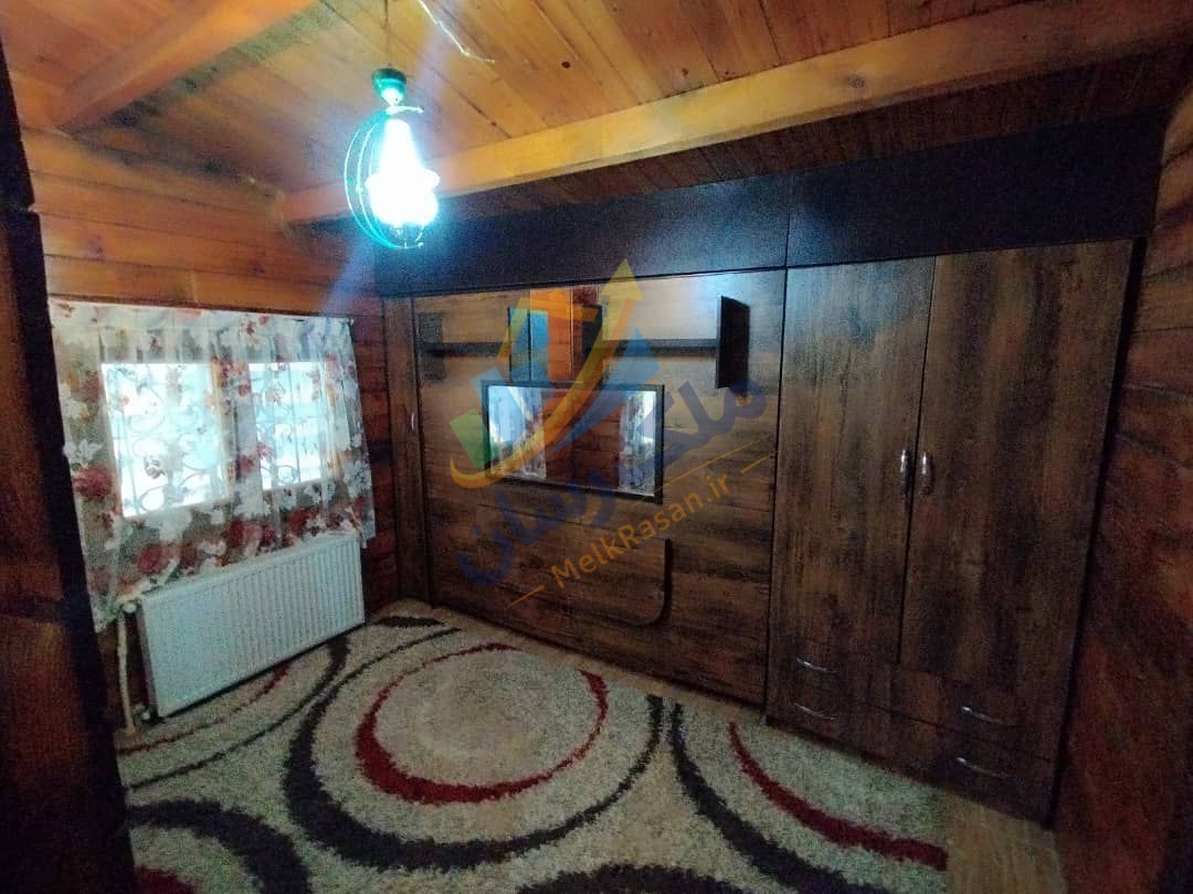 ویلای فلت چوبی نوشهر با ۲۴۰ متر زمین و ۸۰ متر بنا، دو خواب و فول فرنیش نمای اتاق