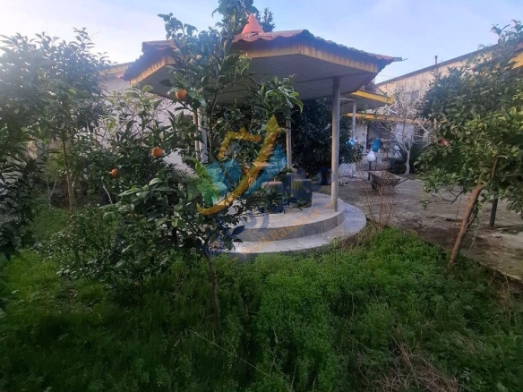 ویلا فلت باغی در جاده دریا سرخرود با ۴۰۰ متر زمین و ۱۰۰ متر بنا، دو خواب و مدارک کامل نمای آلاچیق
